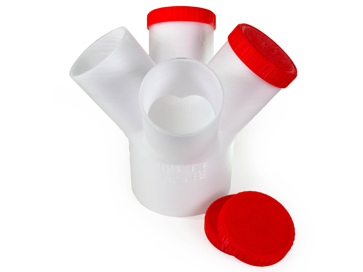 Translucent Dust Medusa 4-way dust collection splitter standing upright, showing its branch openings and caps.