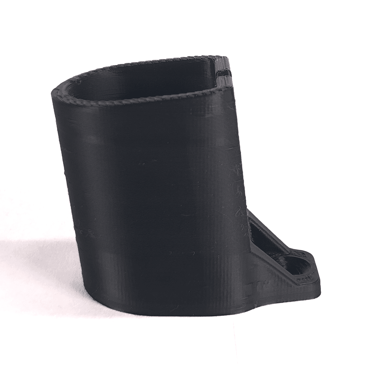 Single Jet Black battery mount showing its slide-in opening and mounting tab; each pack contains four mounts.