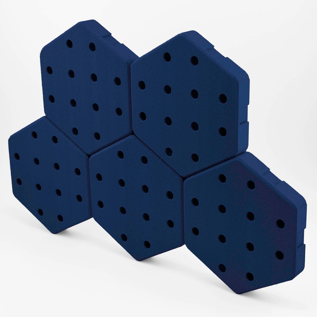 Five connected Hexboard hexagon pegboard tiles in Starry Blue.